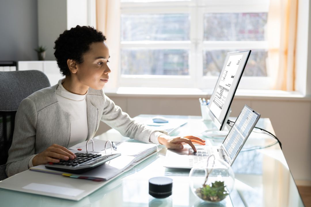 A woman using Condor Software, Inc.